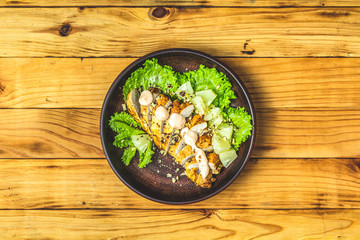 Chicken salad with pineapple, lettuce, cream sauce and walnut