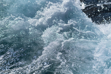 Fototapeta na wymiar Turbulence at sea with breaking surf