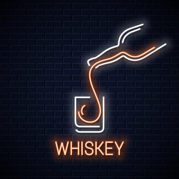 whiskey glass neon banner. Bottle of whisky neon sign on black wall background