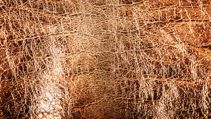 gold foil texture. bronze metal background texture