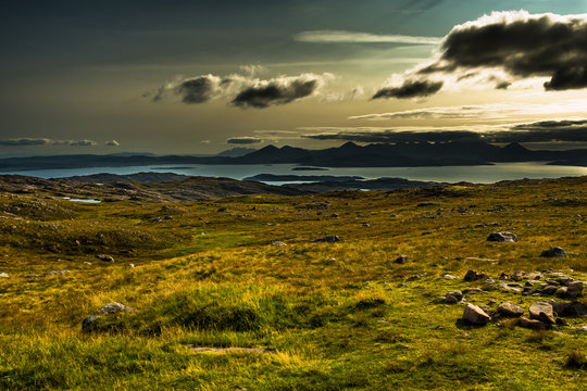 View From Applecross Pass To Scenic Landscape With Curvy Single Track Road And The Isle Of Skye In Scotland