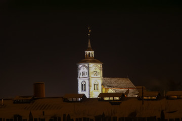 Roros Church in Winter night at Røros old town, Trøndelag county- Røros church, also known under...