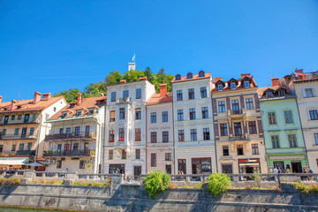 Fototapeta na wymiar riverside with houses and hotels in Ljubljana