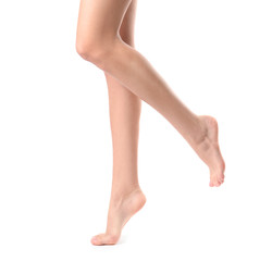 Woman with beautiful legs on white background, closeup. Spa treatment