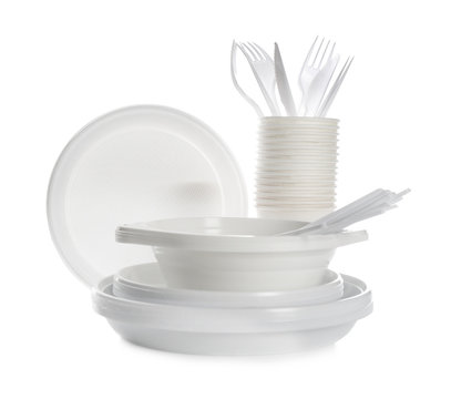 Plastic dishware isolated on white. Picnic table setting