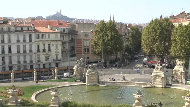 Marseille, France. View of the city and Notre-Dame de la Garde from Palais Longchamp.