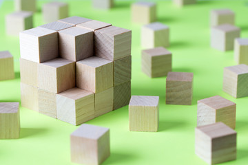 Wood cubes to complete a bigger square block