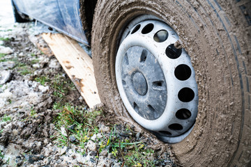 buried car in mud