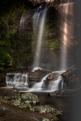 Obraz premium Refreshing Macumba waterfall on the way between Petropolis and Teresópolis in the state of Rio de Janeiro, Brazil