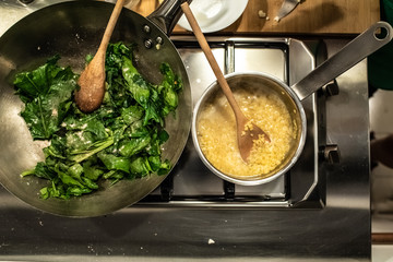Cook sauteed kale vegetables in a wok