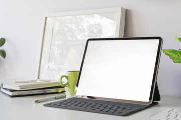 Workspace with mockup blank screen tablet