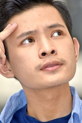 Thoughtful Filipino Teenage Male