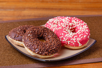 Donuts on a plate on the table