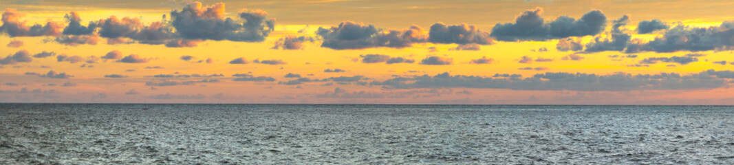 Beautiful sunset with cloudy sky at Phuket, Thailand. 