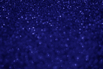 Abstract blue sparkling glitter bokeh background