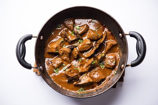 Mutton Liver fry or Kaleji masala, popular Non vegetarian recipe from India and Pakistan. served dry or with curry in a bowl, karahi or plate
