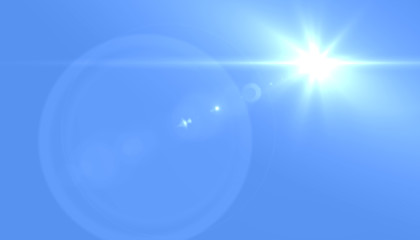 Lens flare light on  blue  background. Easy to add overlay or screen filter over photos	