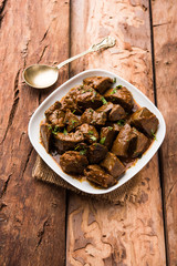 Mutton Liver fry or Kaleji masala, popular Non vegetarian recipe from India and Pakistan. served dry or with curry in a bowl, karahi or plate
