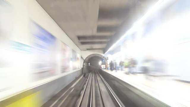 Time lapse. An underground train going through a tunnel.