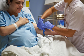 Doctor taking care of woman patient