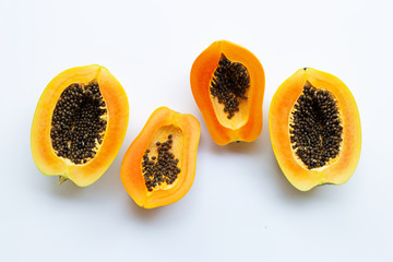 Papaya fruits on a white background.