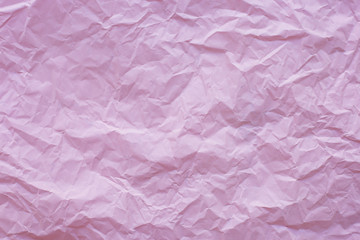 Fototapeta premium Pink crumpled recycle paper