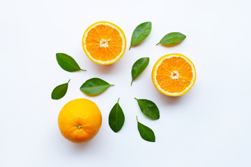 Fresh orange citrus fruits with leaves on white
