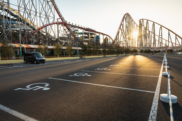 disabled parking in amusement park and over the sunset background japan
