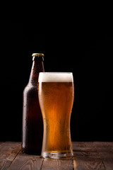 Photo of buttle and glass of beer