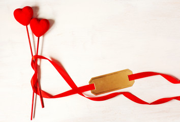 Happy Valentine`s Day with red heart and ribbons