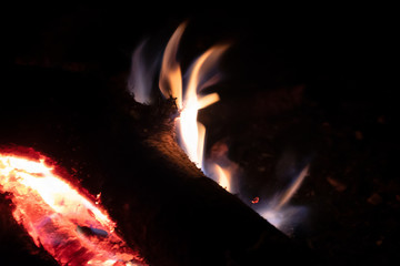 Close up image of coals fire at night