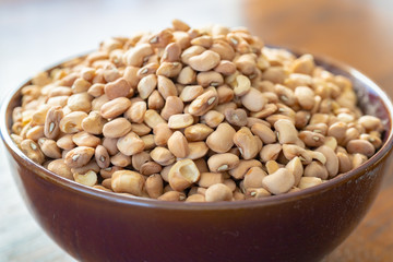 Raw nigerian brown beans in a bowl