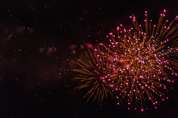 Amazing red fireworks on dark sky