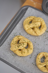 pretzel dough arranges in baking tray