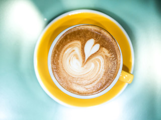 Top view hot coffee cup latte art