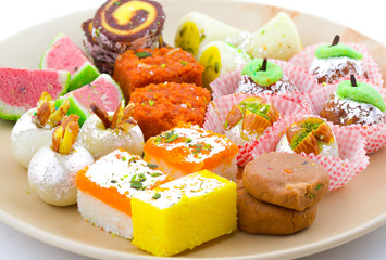 Indian Traditional Mix Sweet Food or Mix Mithai include Peda, Mawa Burfi, Dry Fruits Sweet, Halwa or Coconut Burfi