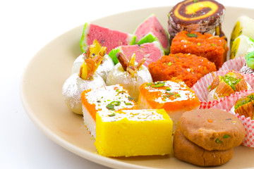 Naklejka na ściany i meble Indian Traditional Mix Sweet Food or Mix Mithai include Peda, Mawa Burfi, Dry Fruits Sweet, Halwa or Coconut Burfi