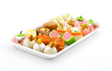 Indian Traditional Mix Sweet Food or Mix Mithai include Peda, Mawa Burfi, Dry Fruits Sweet, Halwa or Coconut Burfi