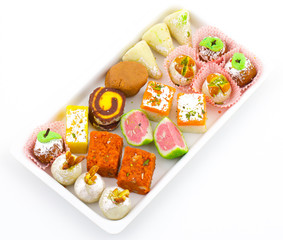 Indian Traditional Mix Sweet Food or Mix Mithai include Peda, Mawa Burfi, Dry Fruits Sweet, Halwa or Coconut Burfi