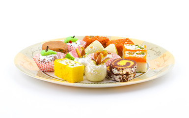 Indian Traditional Mix Sweet Food or Mix Mithai include Peda, Mawa Burfi, Dry Fruits Sweet, Halwa or Coconut Burfi