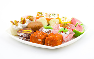 Indian Traditional Mix Sweet Food or Mix Mithai include Peda, Mawa Burfi, Dry Fruits Sweet, Halwa or Coconut Burfi