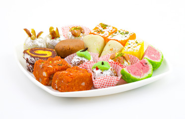 Indian Traditional Mix Sweet Food or Mix Mithai include Peda, Mawa Burfi, Dry Fruits Sweet, Halwa or Coconut Burfi
