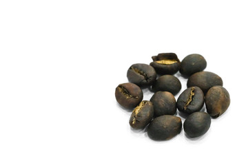 Coffee beans background texture isolated on white background with copy space for text. Royalty high-quality free stock macro photo image roasted brown, black coffee bean isolated on white background