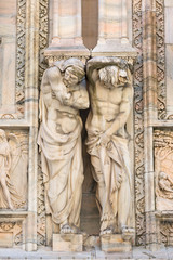 Fototapeta na wymiar Milan Cathedral (Duomo di Milano), gothic church, details on facade, Milan, Italy
