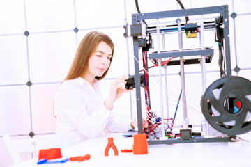 Young women designer in 3d printing lab