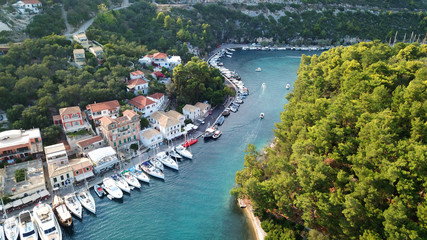 Aerial drone photo of iconic seaside village of Gaios, a safe harbor for yachts and sailboats, Paxos island, Ionian, Greece