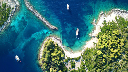 Aerial drone photo of iconic seaside village of Gaios, a safe harbor for yachts and sailboats, Paxos island, Ionian, Greece - obrazy, fototapety, plakaty