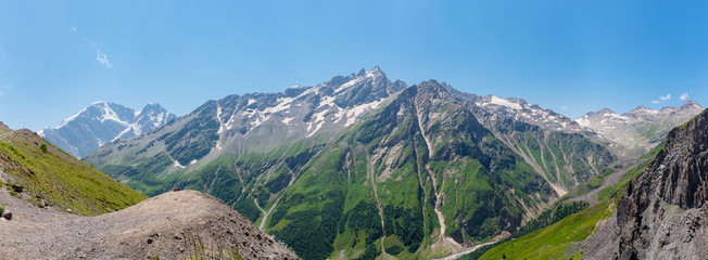 Naklejka na ściany i meble Landscape of mountains in sunny weather. Caucasus