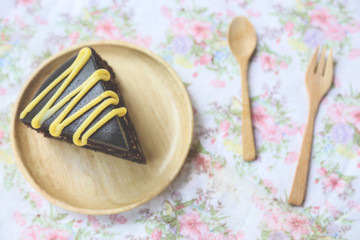 Chocolate chiffon cake on table, Piece of Delectable Chocolate Layer Cake