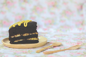 Chocolate chiffon cake on table, Piece of Delectable Chocolate Layer Cake